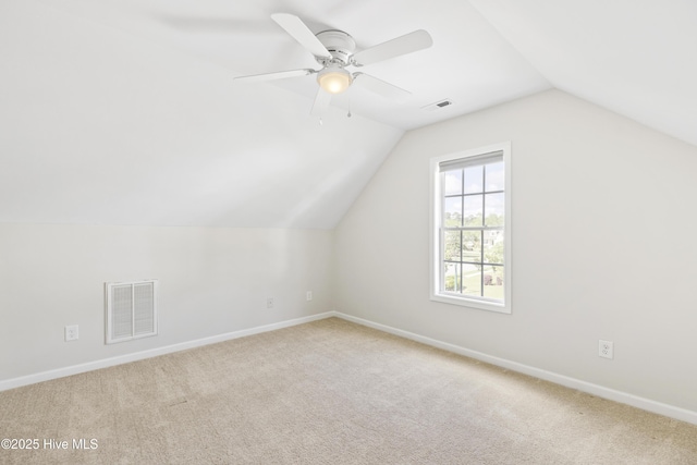 1010 Winterberry Cir, Leland, NC 28451 - additional living space with carpet flooring, lofted ceiling, baseboards, and a ceiling fan