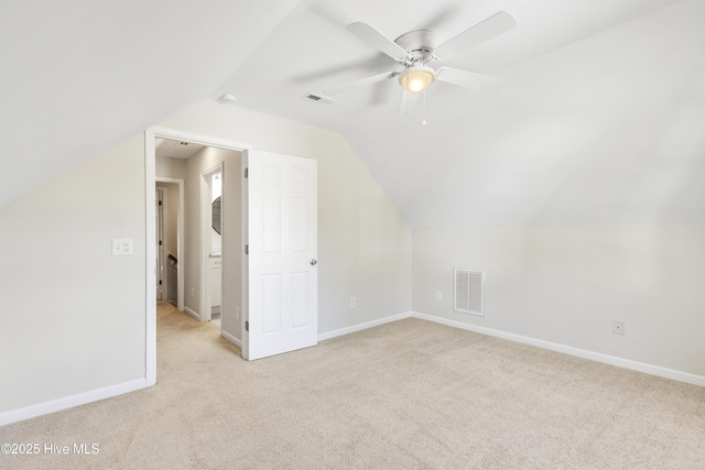 1010 Winterberry Cir, Leland, NC 28451 - additional living space featuring light colored carpet, baseboards, vaulted ceiling, and ceiling fan