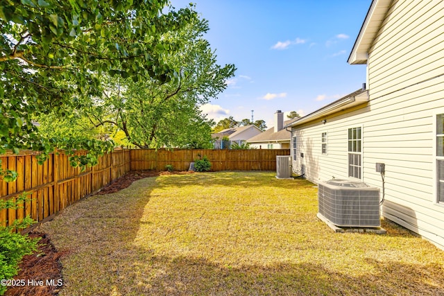 view of yard featuring a fenced backyard and cooling unit