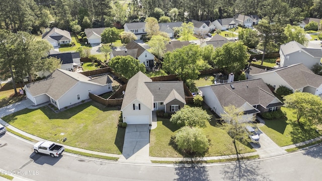 1010 Winterberry Cir, Leland, NC 28451 - aerial view of residential area featuring a tree filled landscape