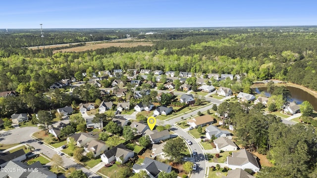 1010 Winterberry Cir, Leland, NC 28451 - view of property location featuring a forest and nearby suburban area
