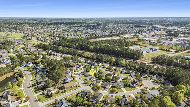 birds eye view of property with a residential view