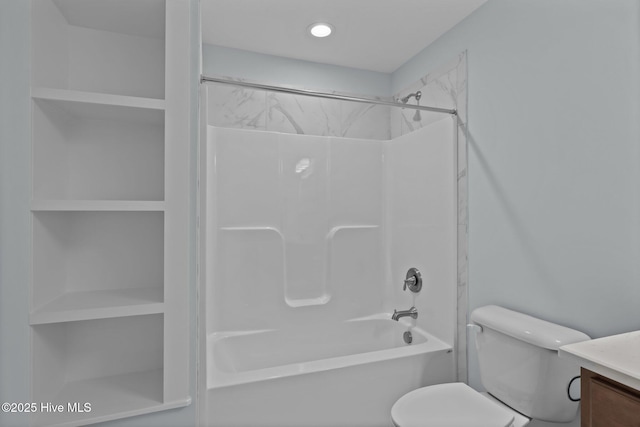 full bathroom with shower / bathing tub combination, vanity, and toilet