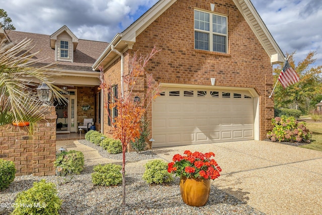 front of property with a garage