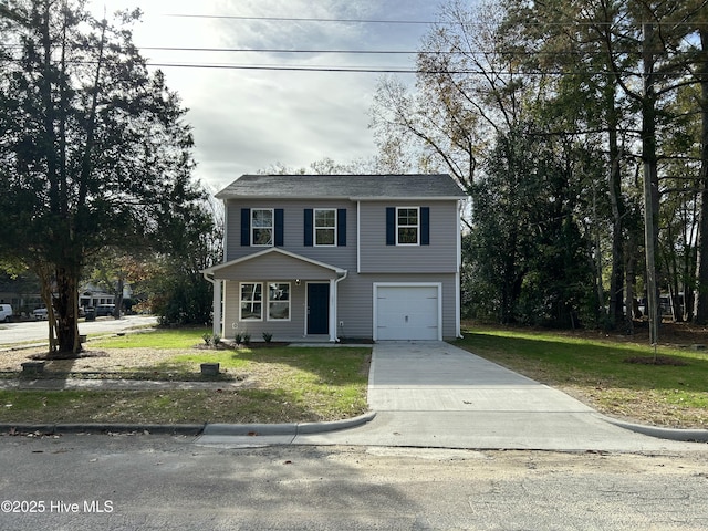 view of front facade featuring a garage and a front yard