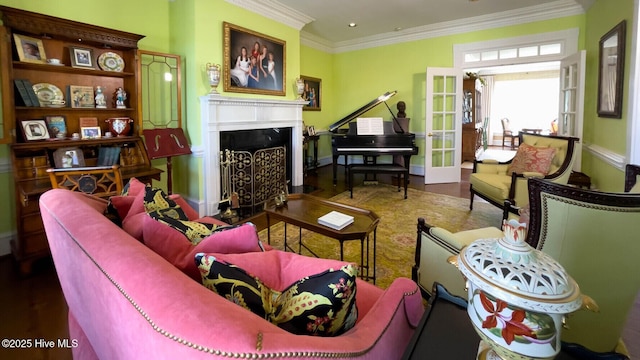 living room featuring french doors, ornamental molding, and hardwood / wood-style flooring