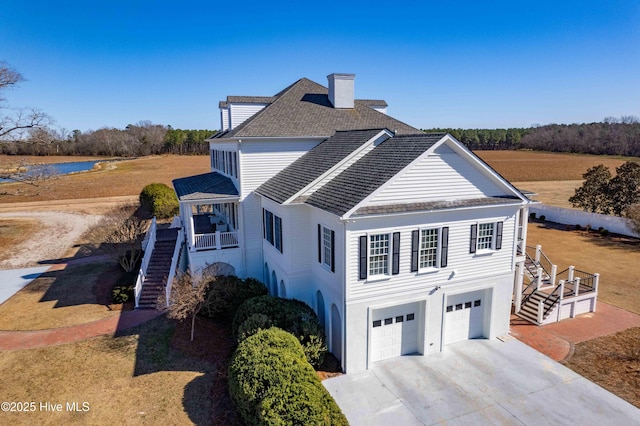 view of side of property with a garage