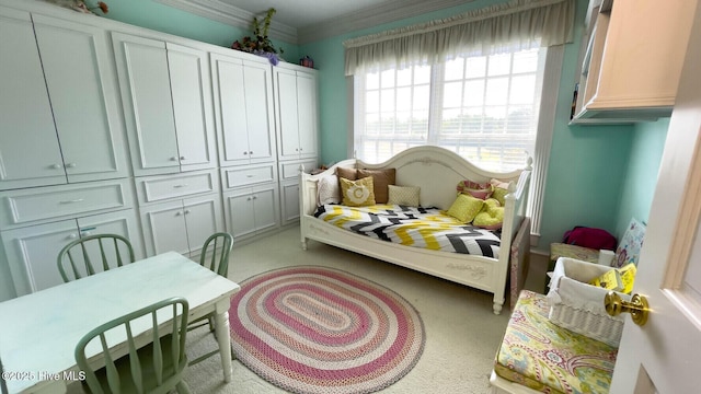 carpeted bedroom with ornamental molding