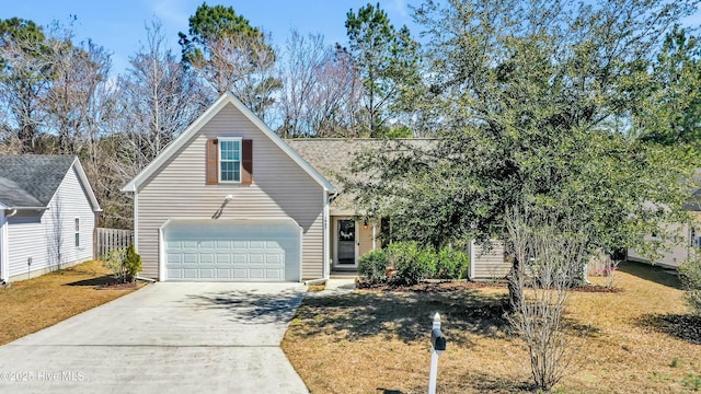 view of front of home with a front lawn and driveway