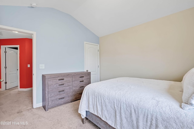 2306 Cottagefield Ln, Leland, NC 28451 - bedroom with light carpet and lofted ceiling