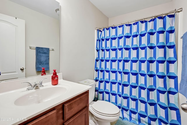 2306 Cottagefield Ln, Leland, NC 28451 - bathroom featuring toilet, vanity, and a shower with shower curtain