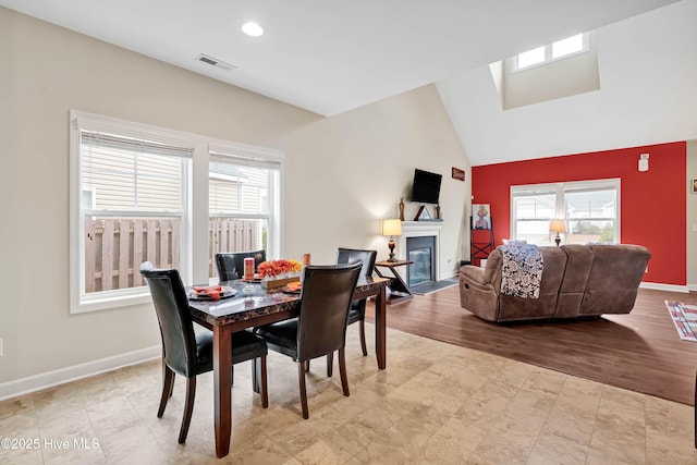 2306 Cottagefield Ln, Leland, NC 28451 - dining room featuring plenty of natural light and lofted ceiling