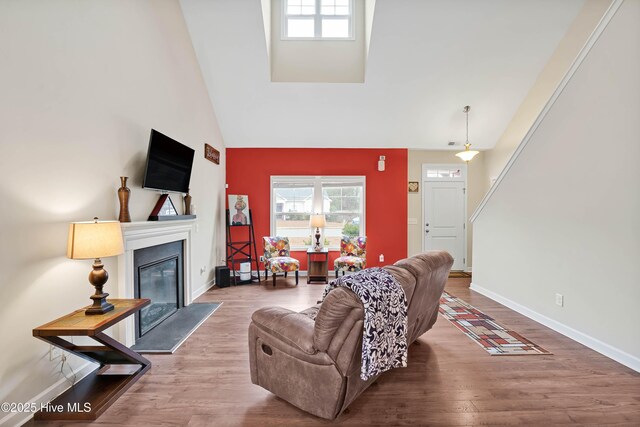 2306 Cottagefield Ln, Leland, NC 28451 - living room with high vaulted ceiling and hardwood / wood-style floors