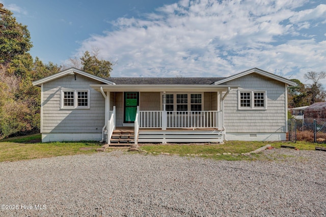 single story home with a porch