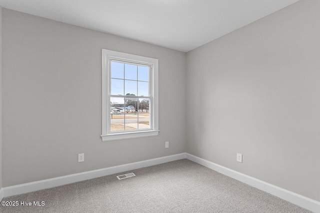 spare room with carpet flooring