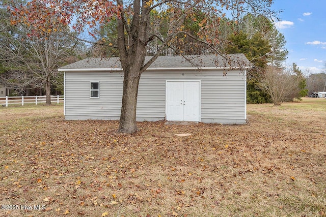 garage with a yard