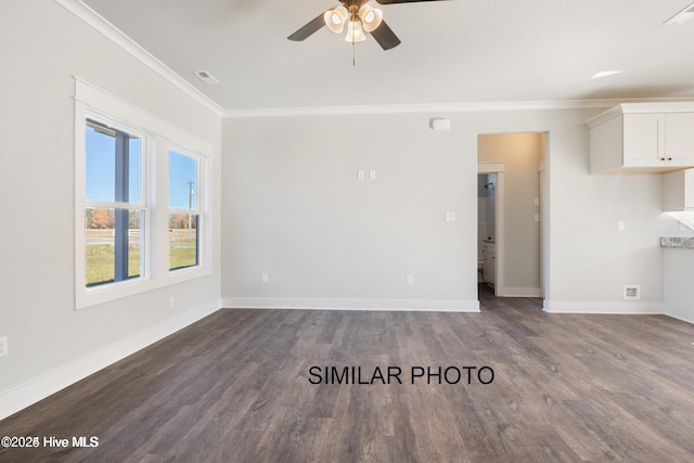 unfurnished living room featuring dark wood-type flooring, ceiling fan, and ornamental molding