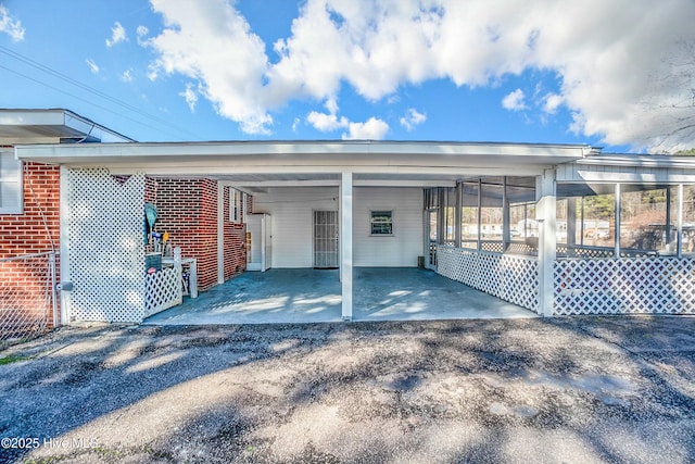 view of parking featuring a carport