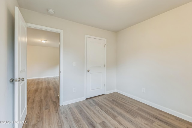 unfurnished bedroom with light hardwood / wood-style flooring