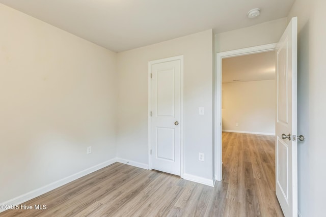 unfurnished bedroom featuring light hardwood / wood-style flooring