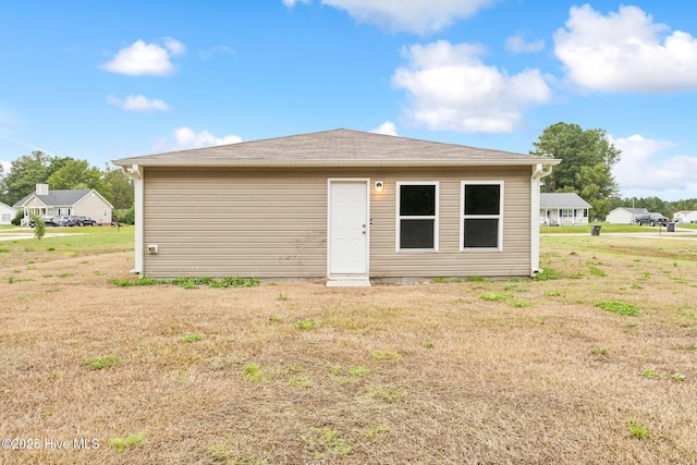 garage with a lawn