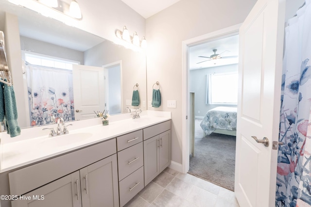 bathroom with vanity, tile patterned floors, and a shower with shower curtain