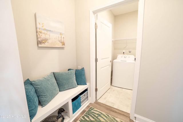 mudroom with washer / dryer and light wood-type flooring