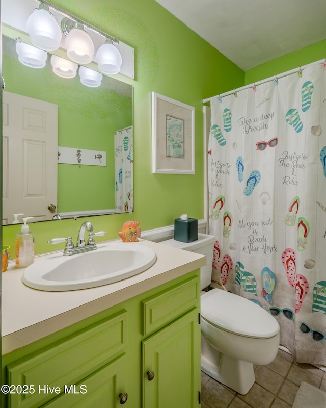 full bath with toilet, a shower with curtain, vanity, and tile patterned floors