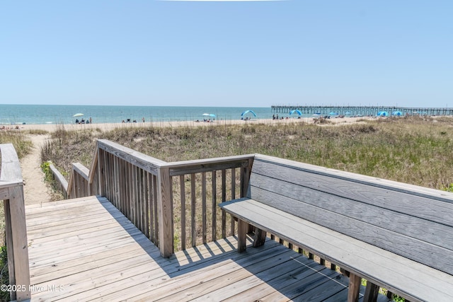 view of community featuring a view of the beach and a water view