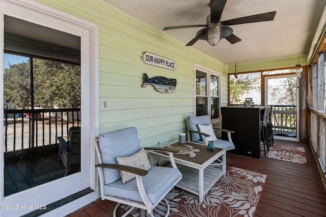169 NW 7th St, Oak Island, NC 28465 - sunroom featuring a ceiling fan