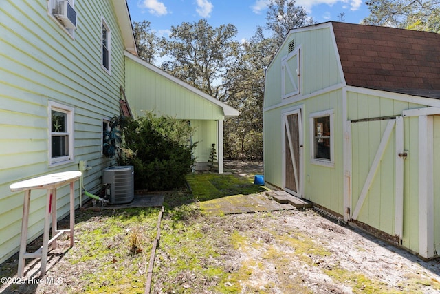 169 NW 7th St, Oak Island, NC 28465 - view of outbuilding with central air condition unit and an outdoor structure
