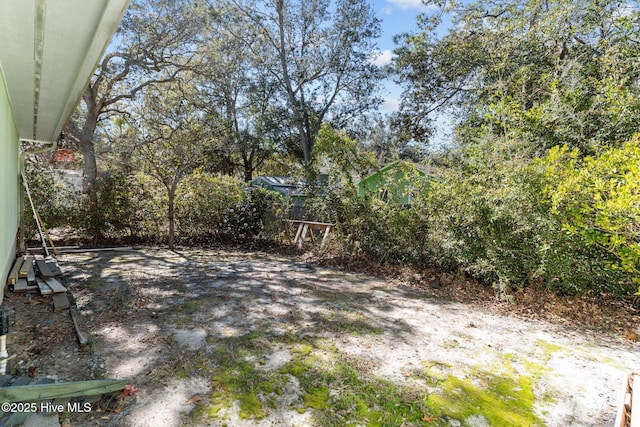 169 NW 7th St, Oak Island, NC 28465 - view of yard with fence