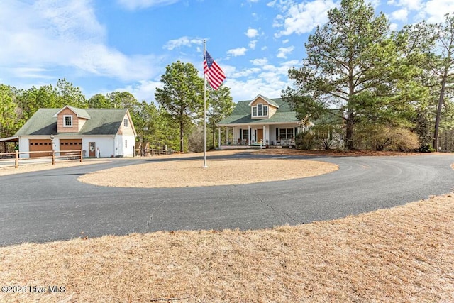 view of front of home featuring covered porch