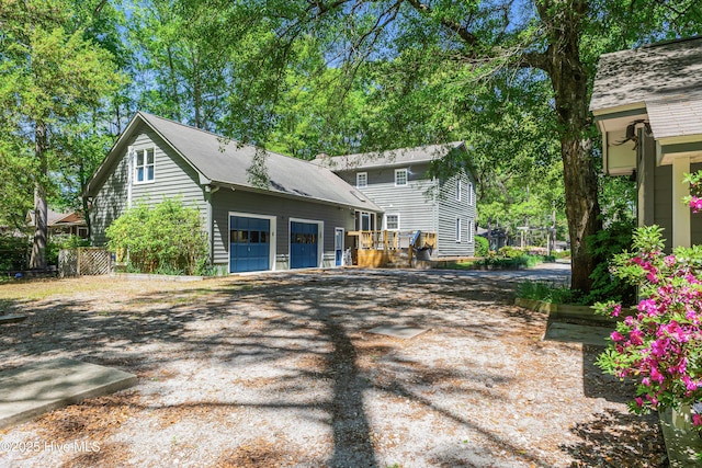 103 Ridge Rd, Hampstead, NC 28443 - view of side of home featuring a garage and an outdoor structure