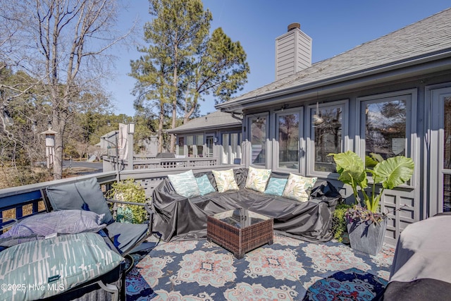 exterior space featuring an outdoor hangout area