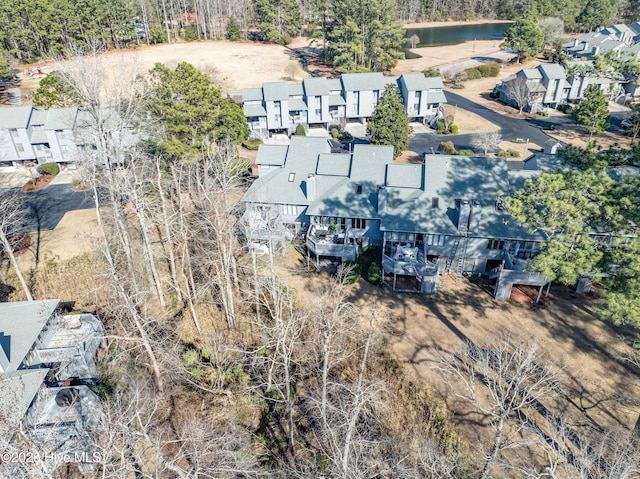 aerial view with a residential view and a water view