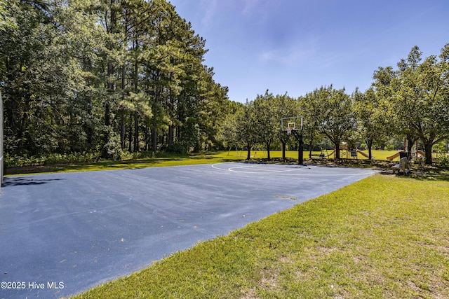 view of basketball court featuring community basketball court and a yard