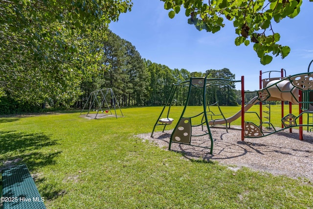 community jungle gym featuring a yard