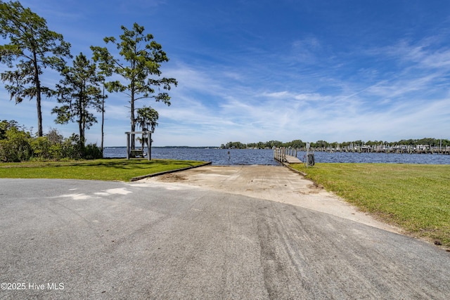 property view of water featuring a dock