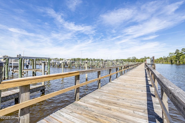 dock area featuring a water view and boat lift