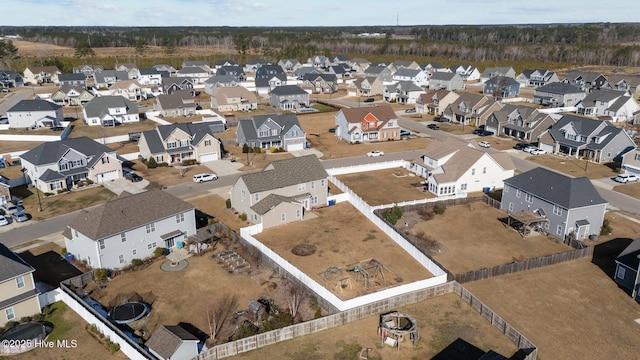 birds eye view of property with a residential view