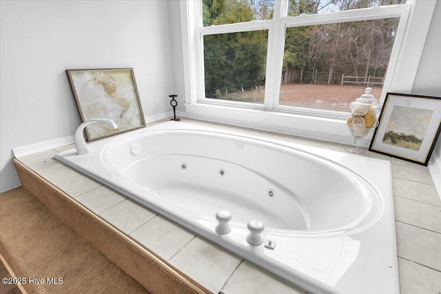 bathroom with tiled tub