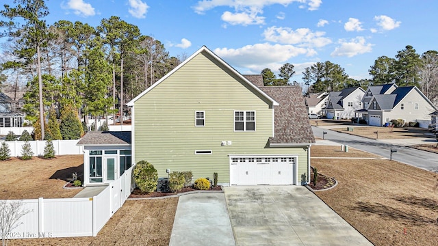 exterior space with a garage