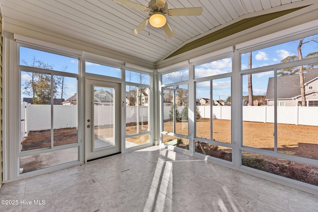 unfurnished sunroom with vaulted ceiling, ceiling fan, and wooden ceiling