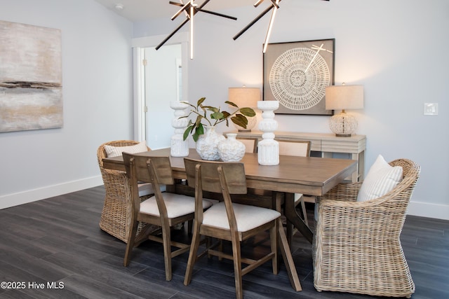 dining space with dark hardwood / wood-style floors