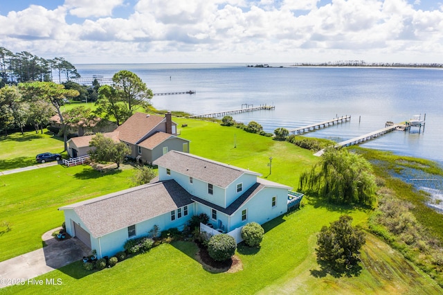 bird's eye view with a water view