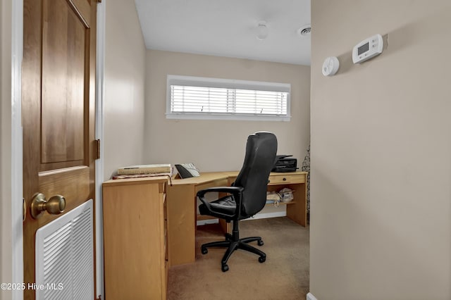 carpeted bedroom with visible vents, a textured ceiling, baseboards, and two closets