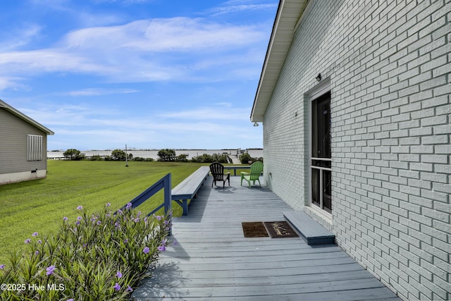 deck featuring a yard