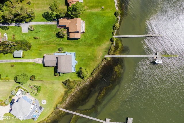 bird's eye view with a water view