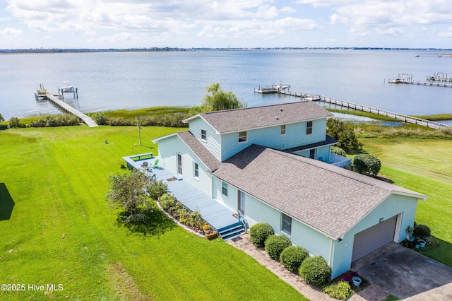 bird's eye view with a water view